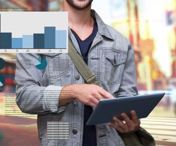 composite of man using tablet computer with graph